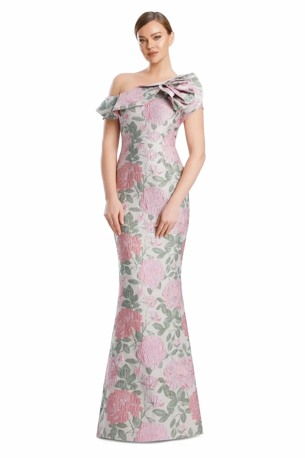 A woman in a floral off-the-shoulder gown with a fitted silhouette.