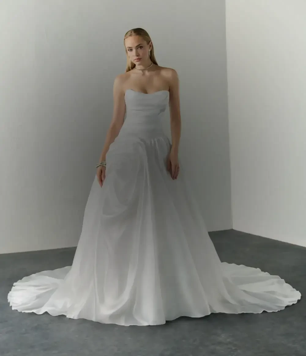 Model wearing a white bridal gown