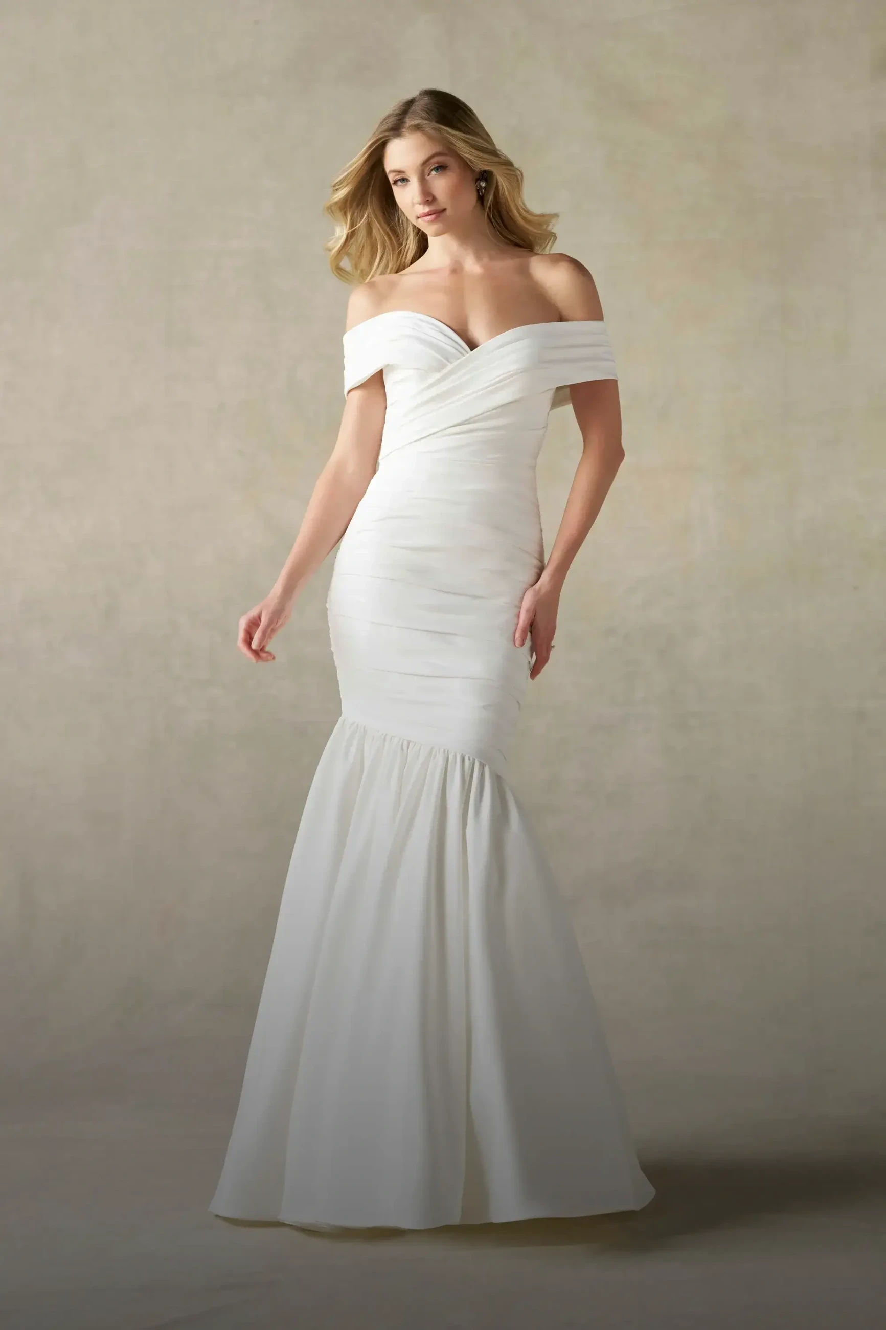 Model wearing a mermaid style dress