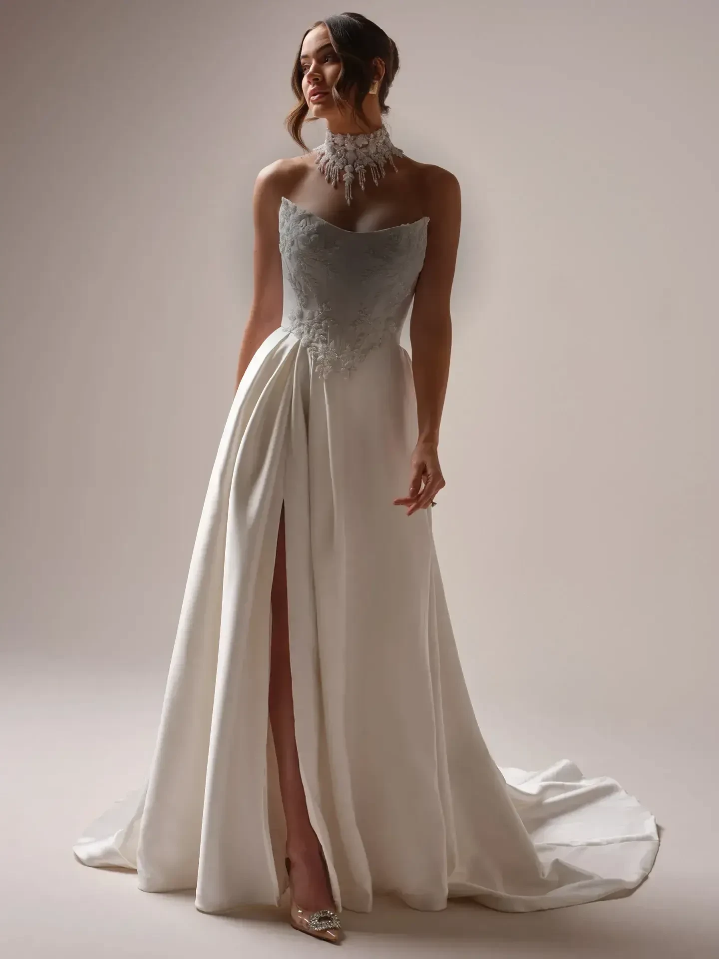 Model wearing a white bridal gown