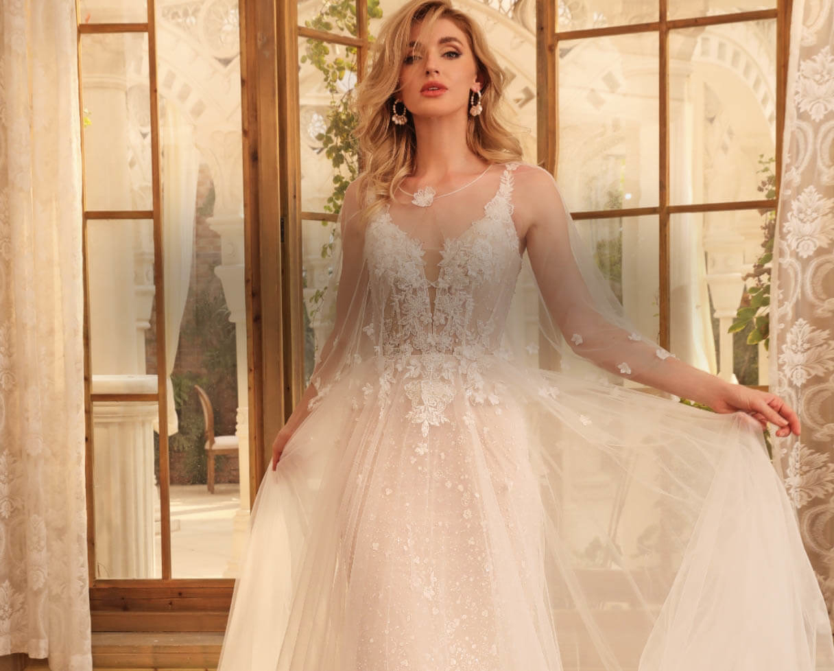 Model wearing a white bridal gown