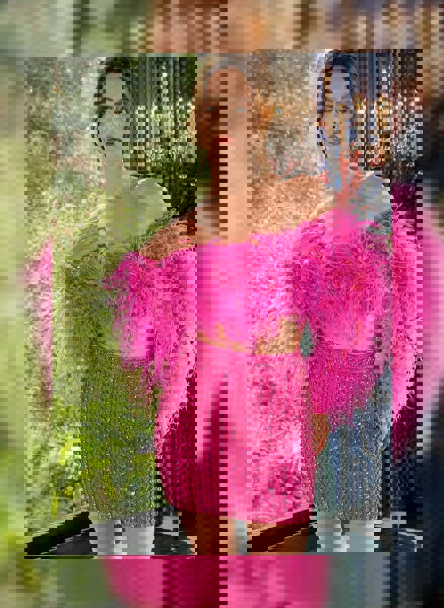 Model wearing a social occasion dress