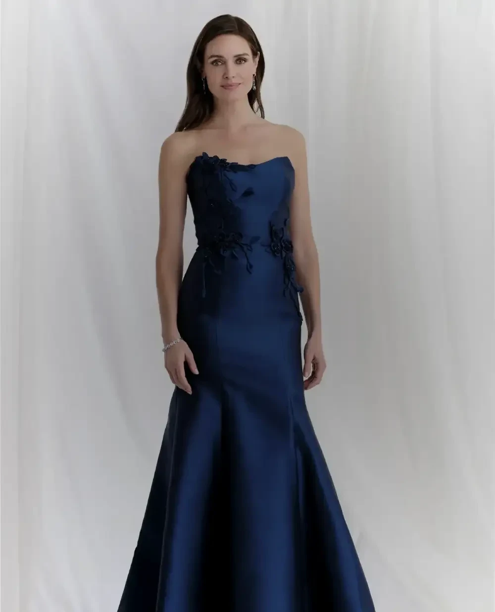 Models wearing a mother dresses. Mobile image
